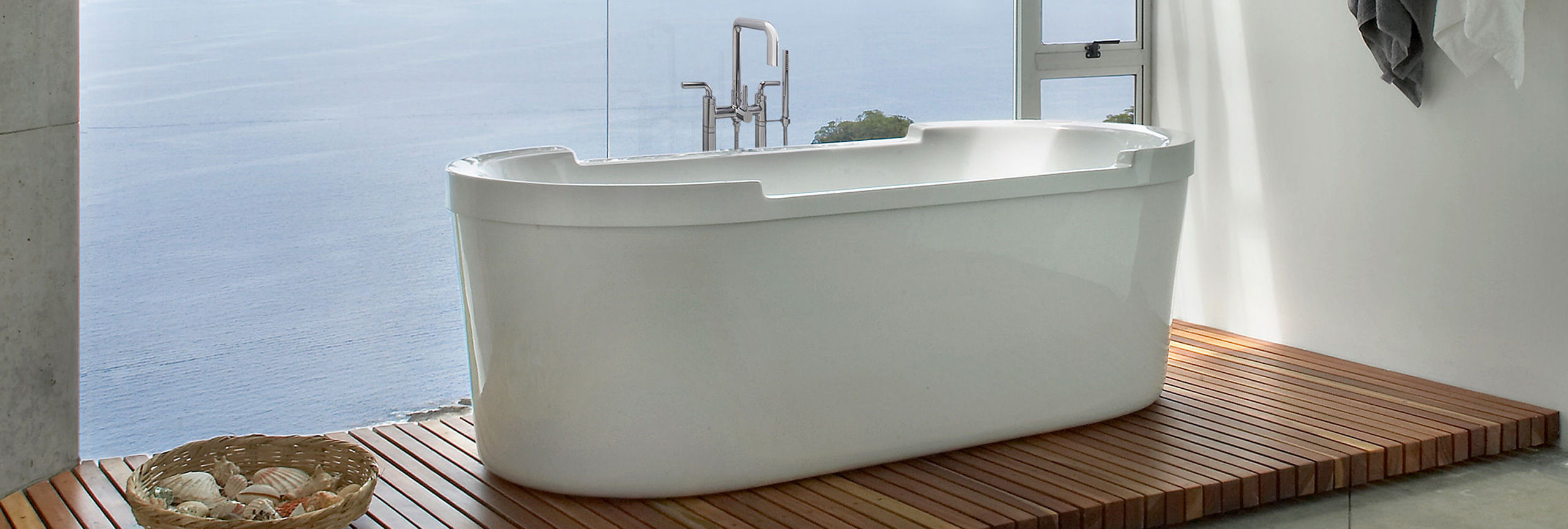 Bathroom series Bolsa floor mount tub filler with tub on teak flooring